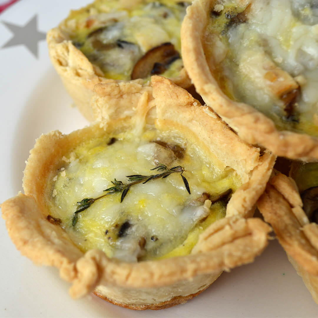 Mini turkey and mushroom quiches on a plate