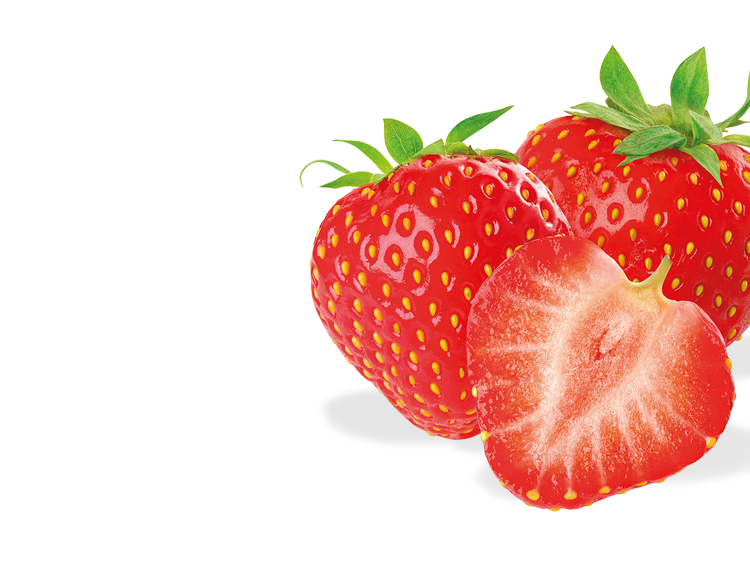 a strawberry cut in half in front of two whole strawberries