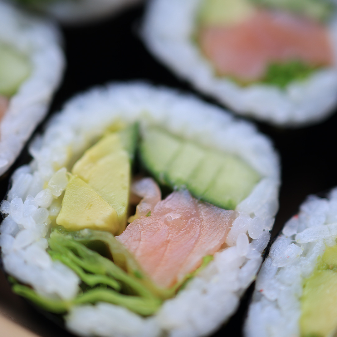 Avocado and salmon sushi rolls