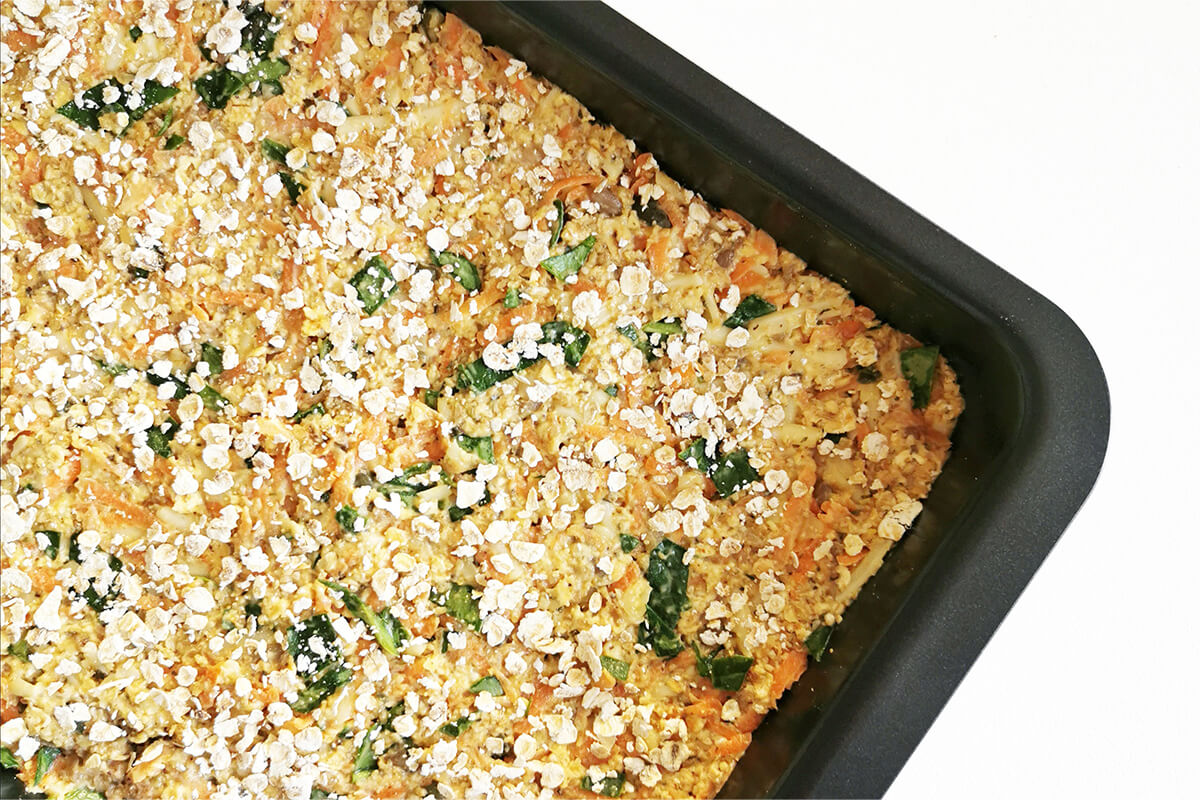Savoury flapjack mix in a baking tray