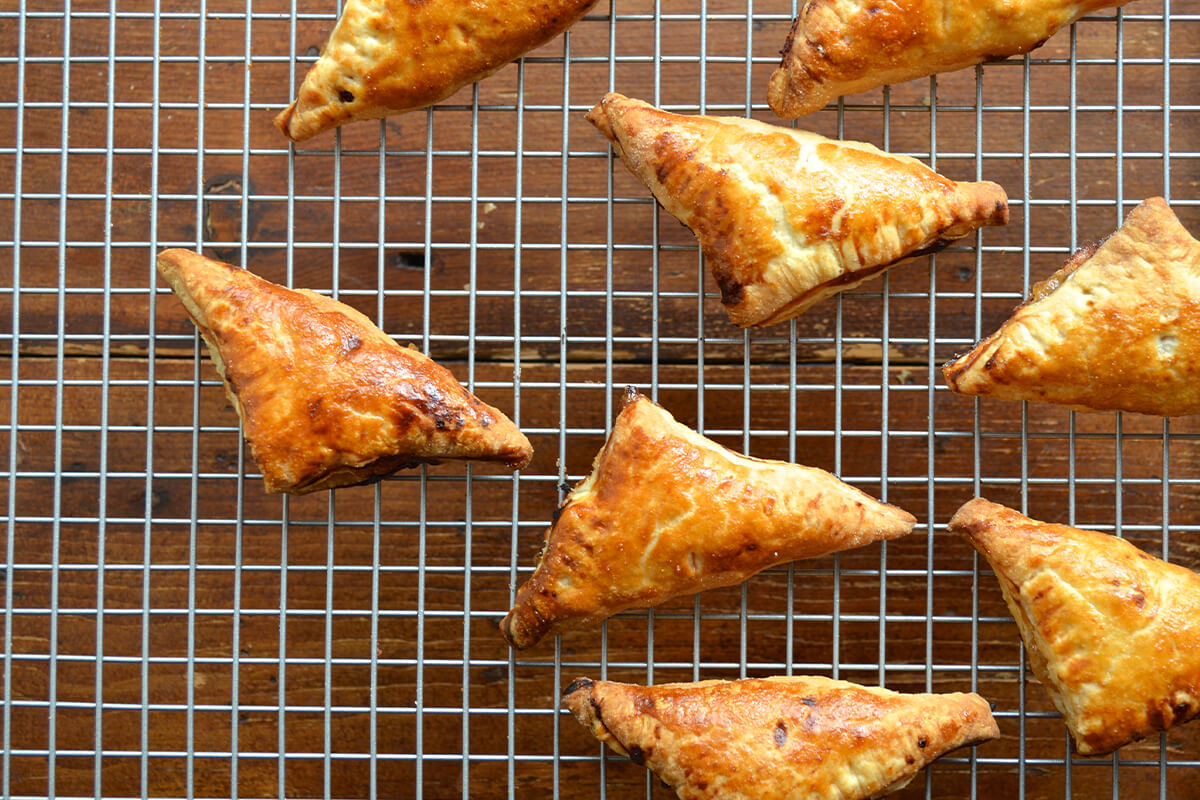 Apple turnovers on a cooling rack