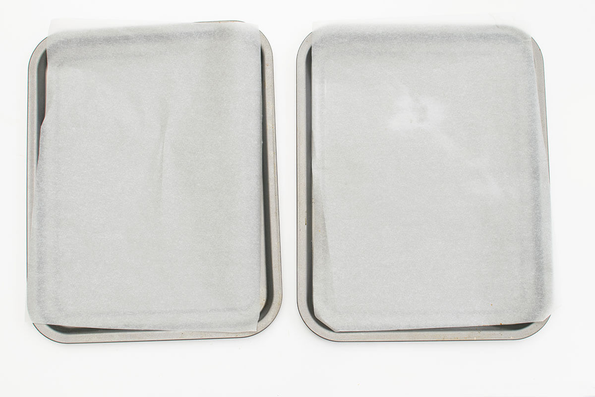 Two lined baking trays