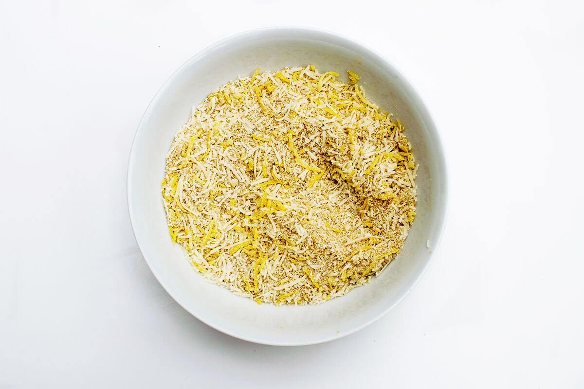 A bowl of breadcrumbs, cheese and lemon zest