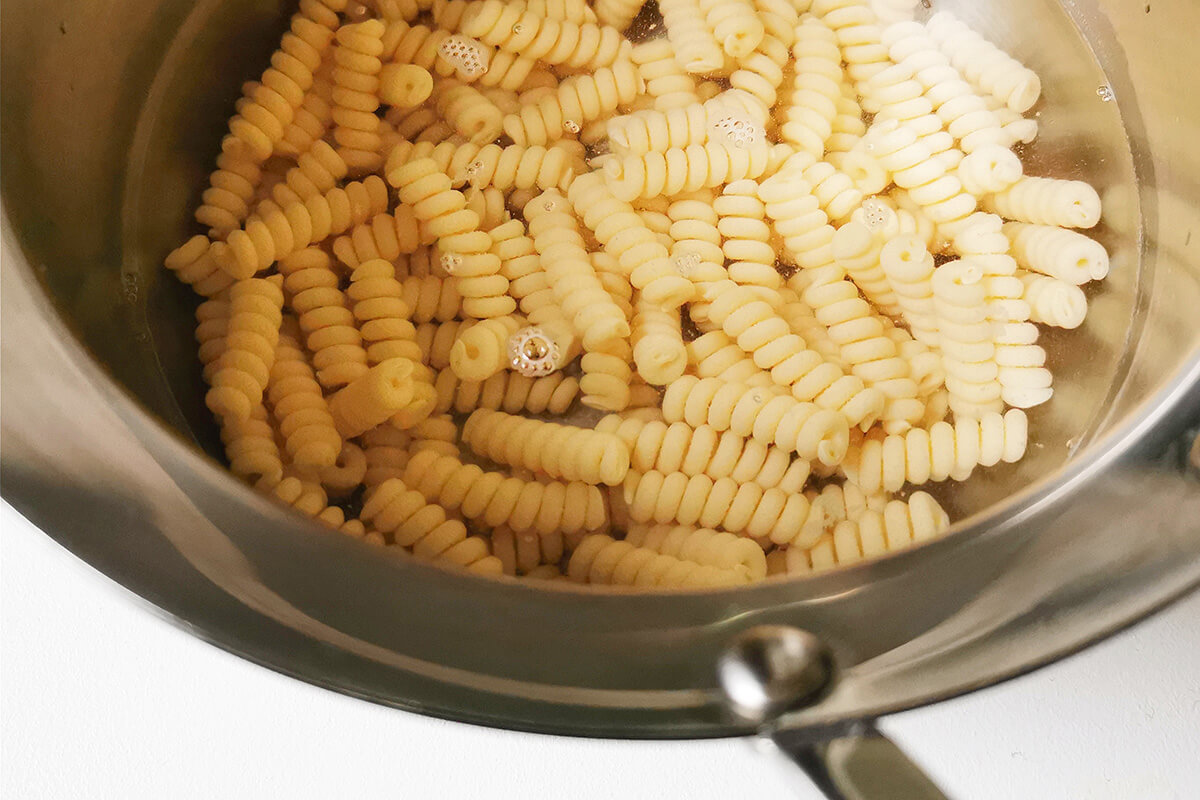 A saucepan of pasta being cooked
