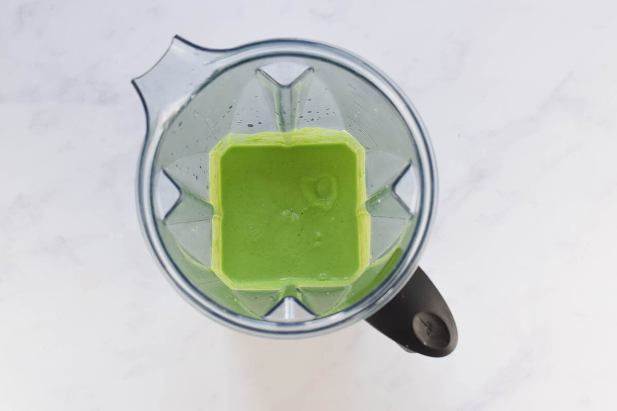 Blended pea and mint puree in a blender