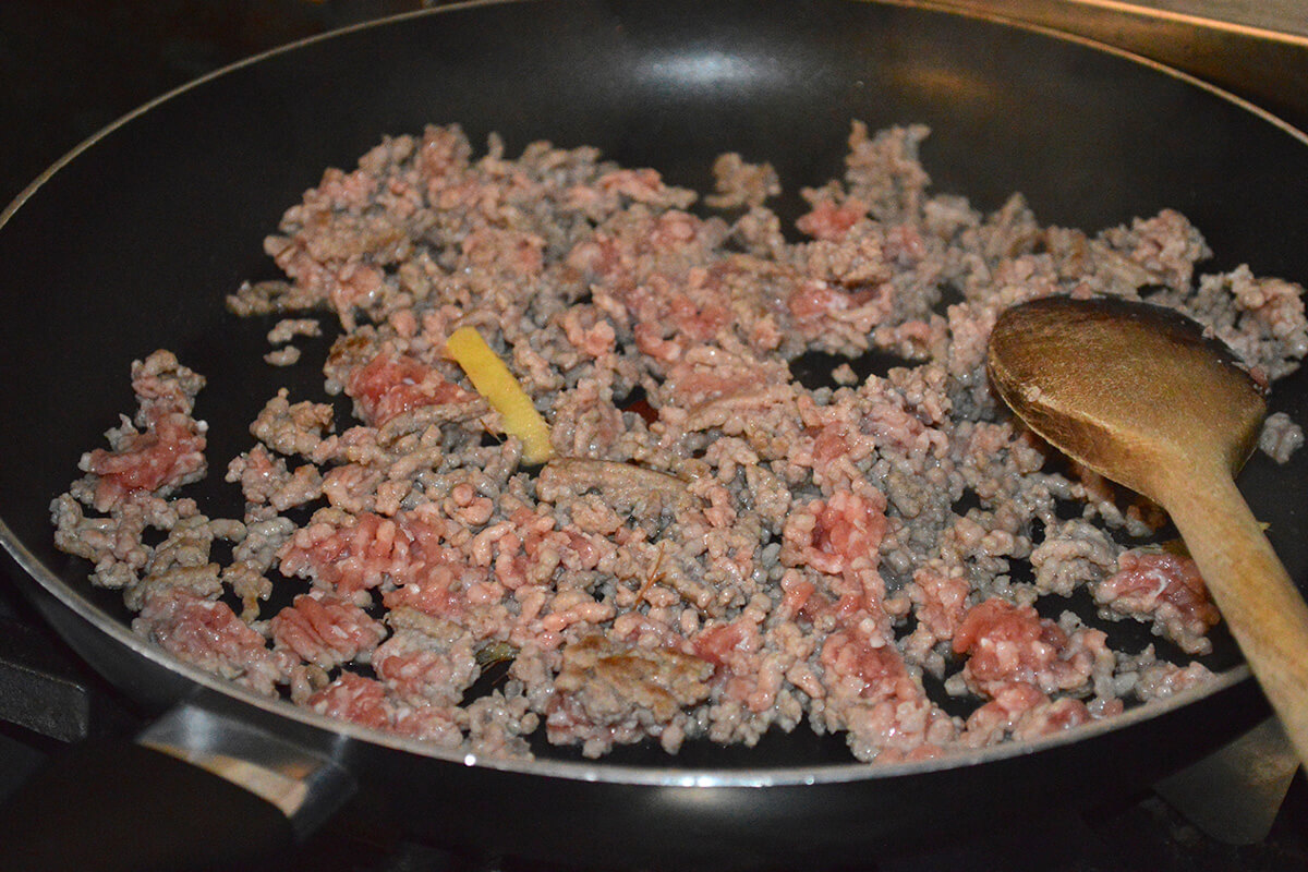 Minced pork and ginger in a frying pan