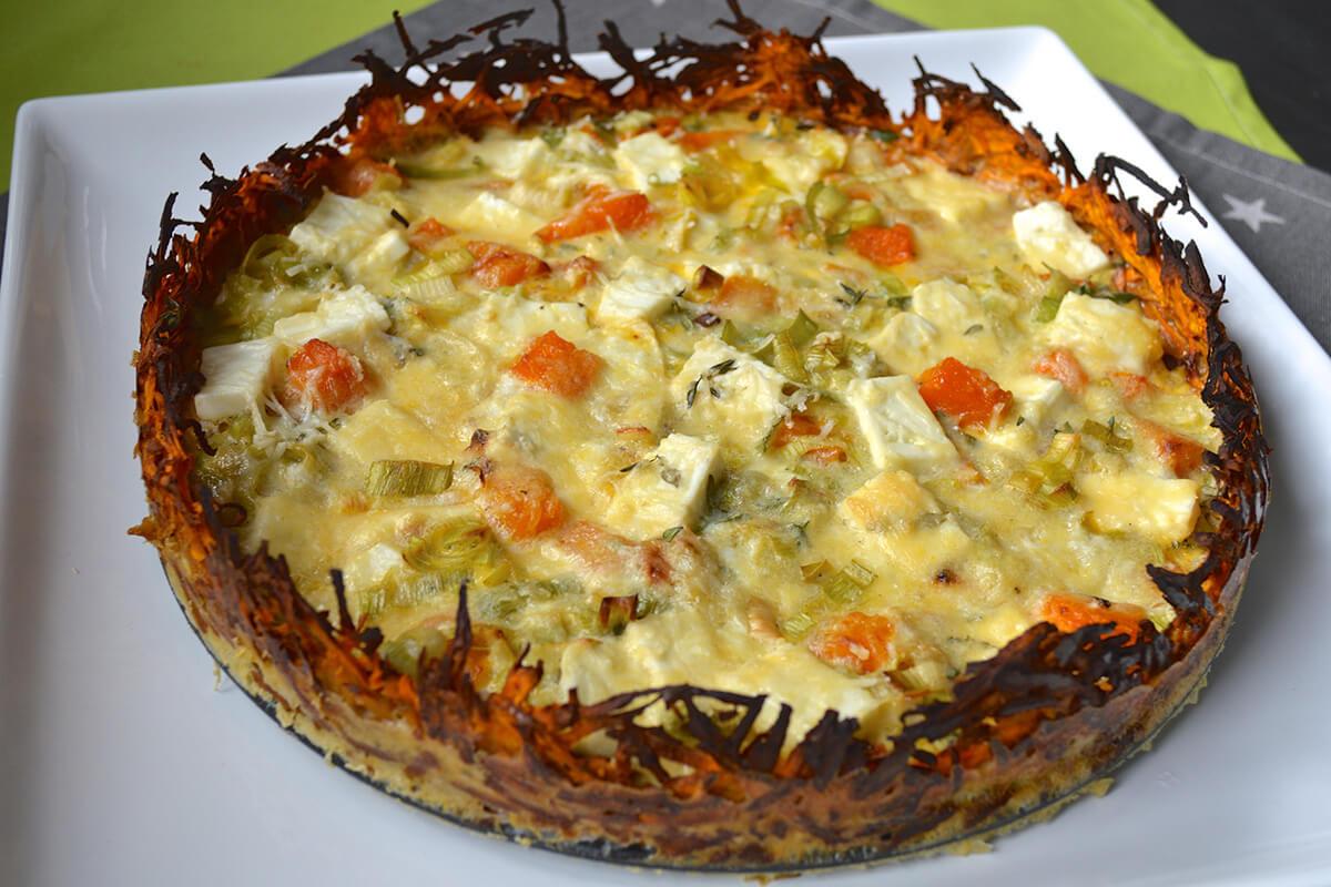 Cooked Sweet Potato Crust Tart on a serving tin